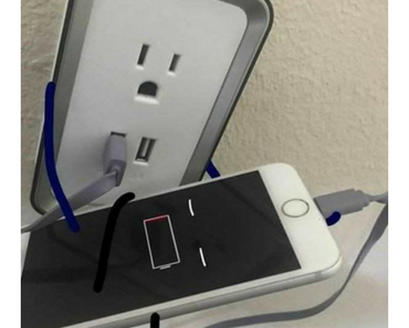silly photo of wall outlet with hands and face concerned about dying iphone with hands and face