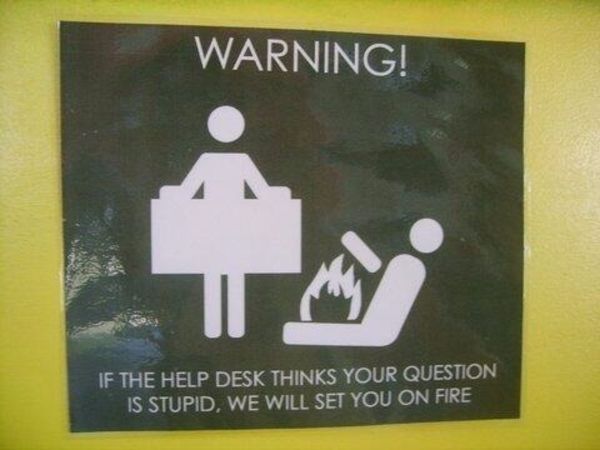 funny picture of sign that says the help desk will set you on fire if your question is stupid