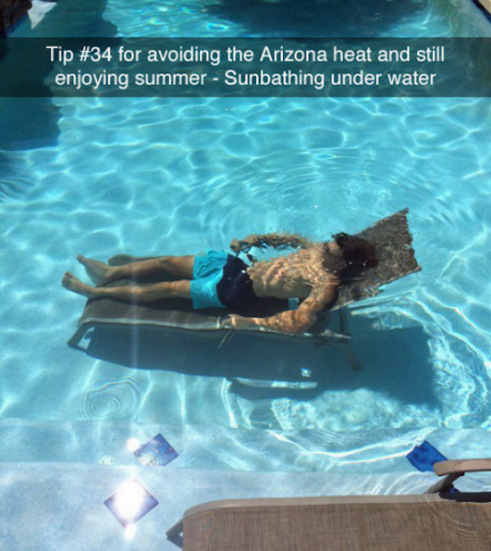 funny photo of man sunbathing underwater in pool