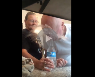 funny video of old woman pulling the classic water bottle prank on her husband