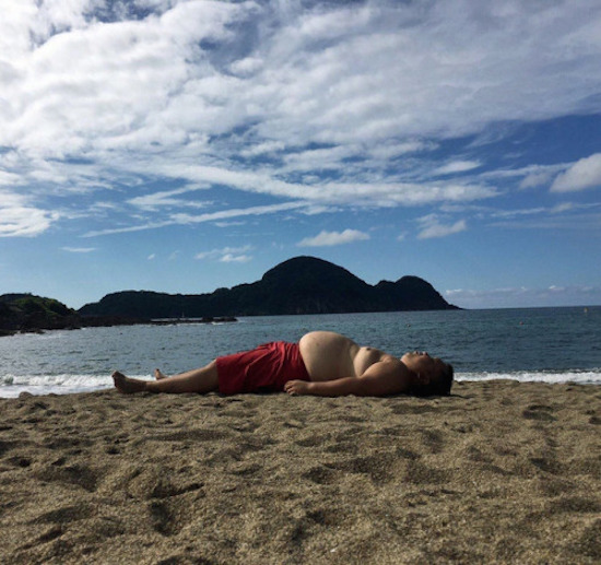 funny pic of man's body looks like island landscape