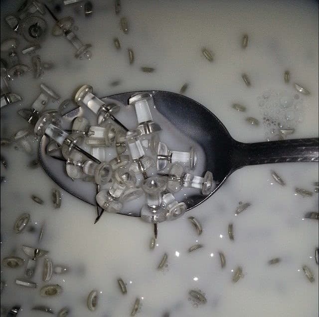 thumb tacks in what appears to be milk cursed image, thumb tacks in what appears to be milk cursed picture, thumb tacks in what appears to be milk cursed pic