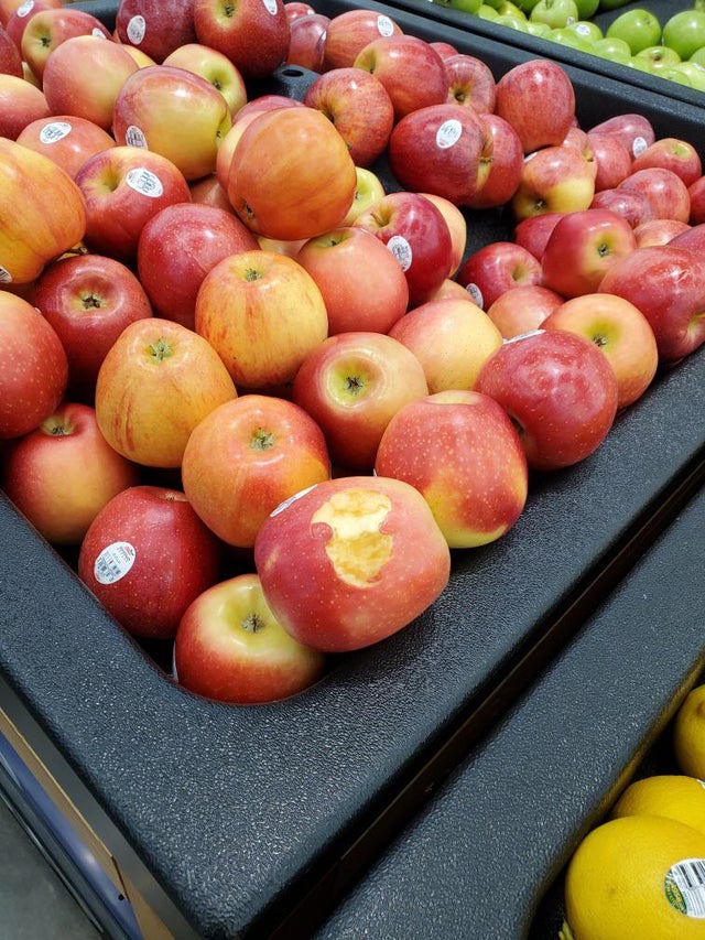 people of walmart - eating apple and leaving it