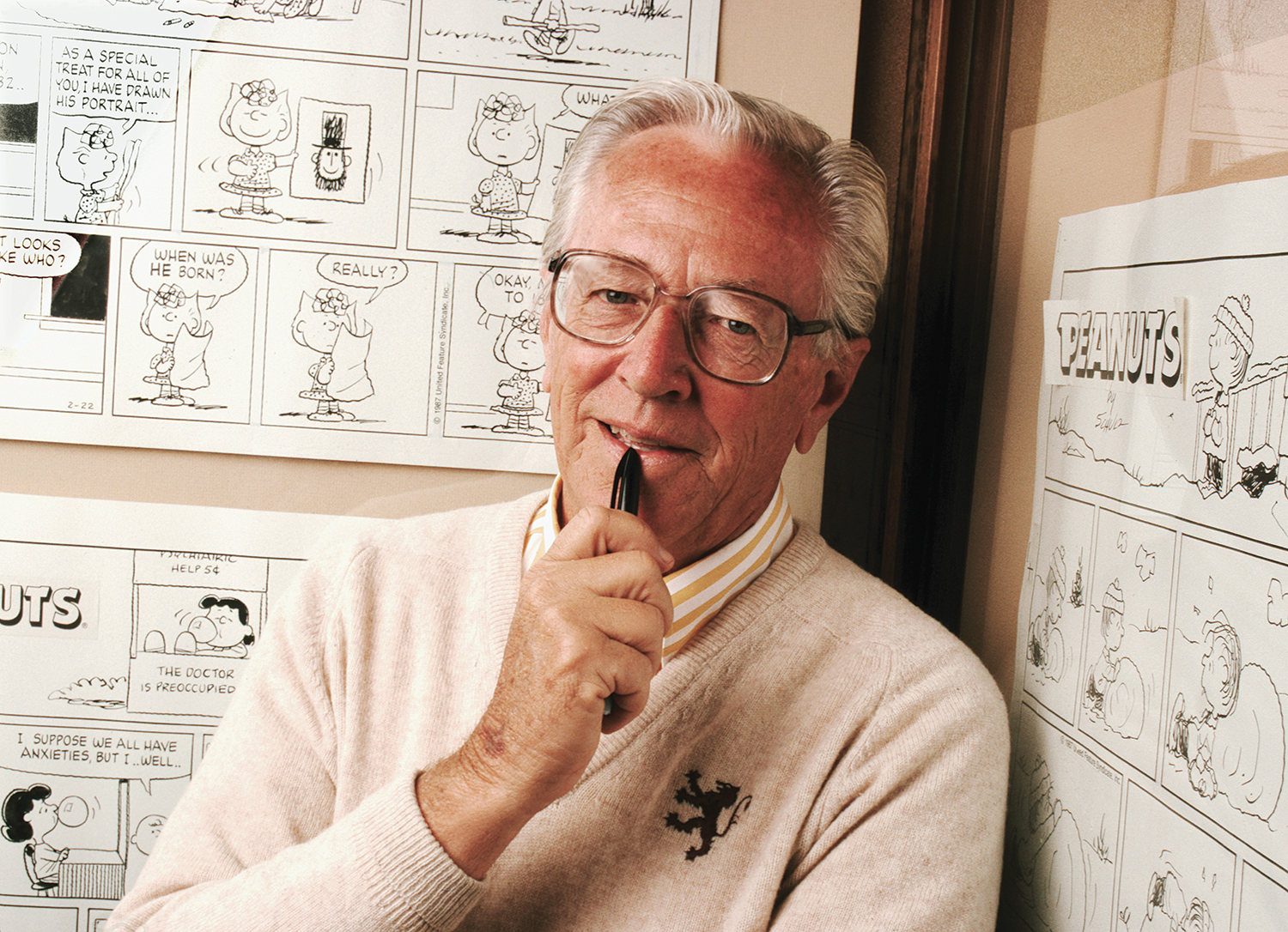 highest paid dead celebrities of 2020, charles Schulz near a bunch of Peanuts cartoons