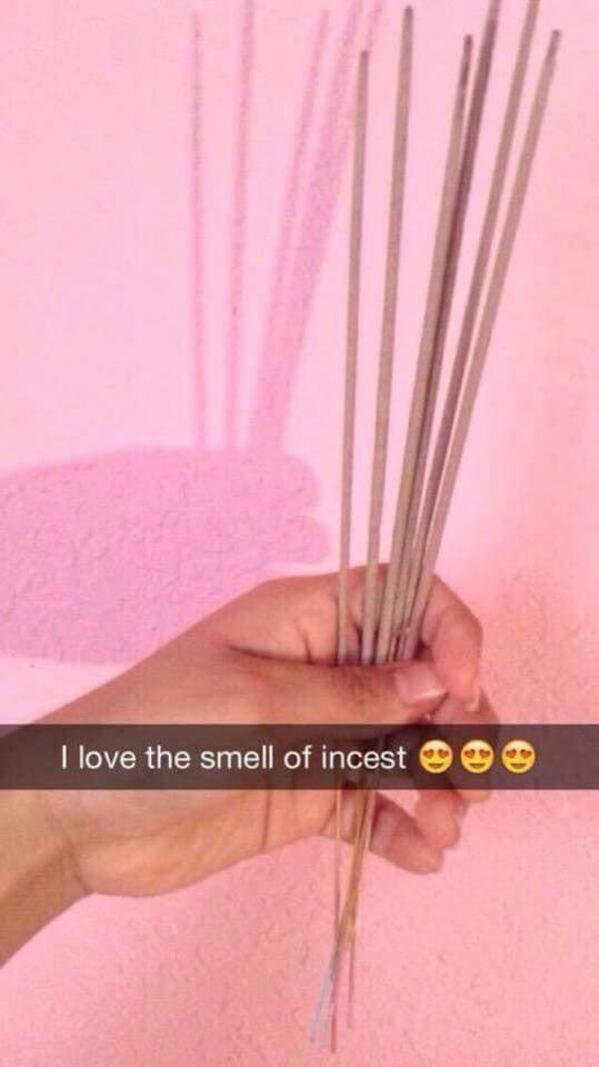 woman holding sticks of incense but she wrote I love the smell of incest, bone apple tea, funny grammar spelling fail