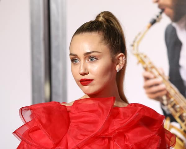 Celebrity weird facts, strange true stories about celebs, celeb facts that will make you rethink them forever, miley cyrus, red dress