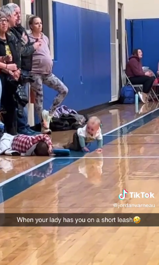 mom keeps baby on leash